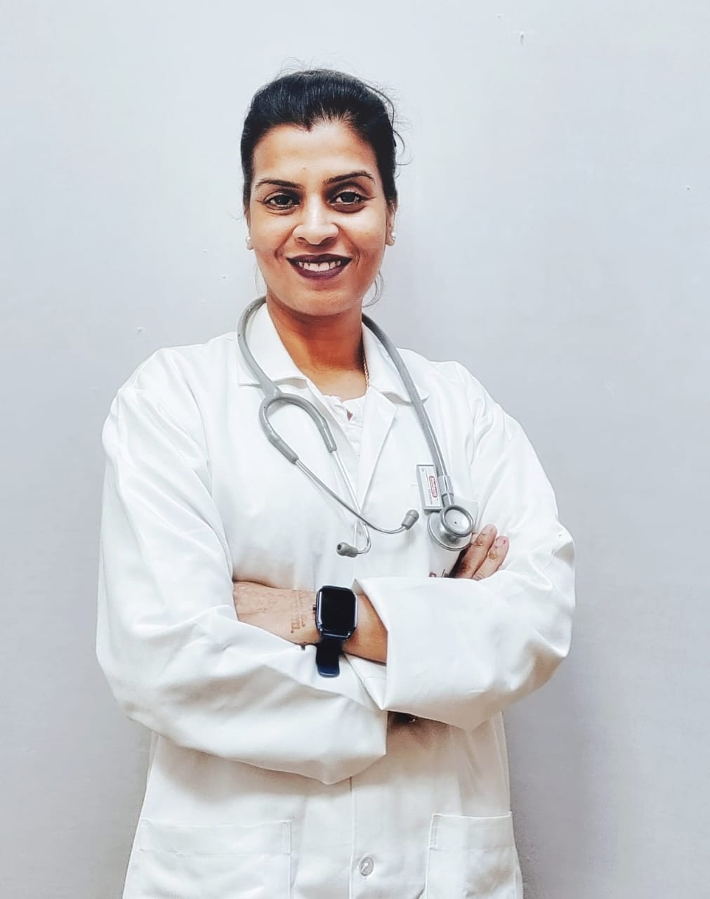 Dr. Shalini Rana in clinical coat with stethoscope